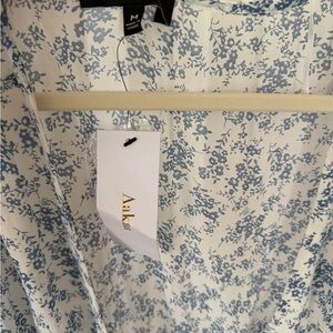 Aakaa Cream Blouse with Blue Floral Pattern